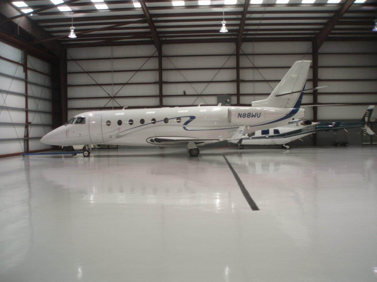 white flooring at a private jet hangar